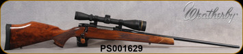 Consign - Weatherby - 240WbyMag - Mark V Deluxe - AA grade Claro walnut Monte Carlo stock w/rosewood forend tip & Grip Cap/Blued, 24"Barrel - c/w Leupold VX-2, 6-18x40, LRV Duplex reticle