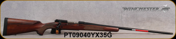 Winchester - 264WinMag - Model 70 Sporter - Bolt Action Rifle - Satin finish Grade AA Walnut w/cut checkering & Deluxe Cheekpiece /Polished Blued, 26" Barrel, 1:9"Twist, Mfg# 535202229, S/N PT09040YX35G - bruise on top of rear buttstock(pictured)