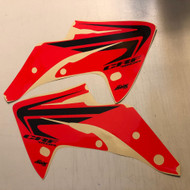 CRF150R Wing Shroud Graphics Red Background