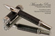 Handmade Rollerball pen made from Faux Leather with Rhodium / Black Titanium finish.   Side view of pen - Stock Picture