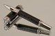 Handmade Rollerball pen made from Faux Leather with Rhodium / Black Titanium finish.   Main view of pen  - Stock Picture