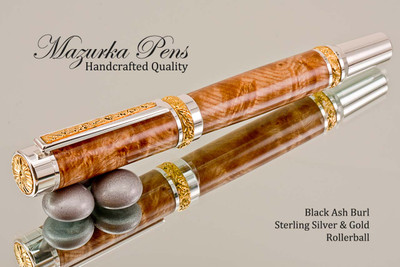 Handcrafted wood pen made from Black Ash Burl with Sterling Silver and Gold finish.  Top view of pen and cap.