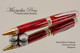 Handmade Ballpoint Pen handcrafted from Red and Black TruStone with Chrome/Gold finish.  Side view of pen.