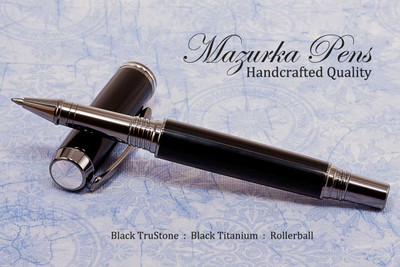 Handmade pen made from black TruStone.  Handcrafted pen by our artist.  Tip view of pen cap.