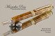 Handmade Fountain Pen handcrafted from Black Ash Burl wood Rhodium and Gold finish.  Bottom view of pen.