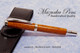 Handmade Rollerball Pen made from Lacewood with Rhodium and Gold trim.  Handcrafted pen by our artist.  Main view of pen cap. (black pouch not included)