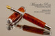 Handcrafted fountain pen made from Amboyna Burl with Rhodium/Black Titanium finish.  Nib view of pen and cap.