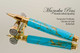 Hand Made Rollerball Pen made from Turquoise and Gold TruStone with Gold and Chrome finish.  Tip view of pen and cap.