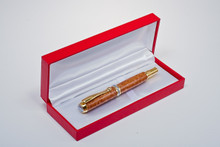 Red leatherette pen and / or pencil case with white interior - large box.  Shown open.