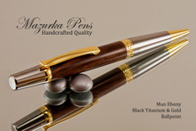 Handmade wood pen made from Mun Ebony.  Handcrafted pen by our artist.  Top view of pen .
