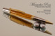 Handcrafted pen made from Zebrawood with Black Titanium & Gold finish.  Front view of pen