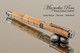 Handmade Rollerball Pen made from Curly Maple with Chrome trim.  Handcrafted pen by our artist.  Main view of pen cap.
