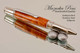 Handmade Ballpoint Pen made from Amboyna Burl with Stainless Steel finish.  Tip view of pen.