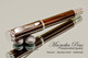 Handmade Rollerball Pen Handcrafted from Ziricote with Polished Stainless Steel finish.  Main view of pen and cap.