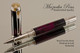 Handmade Rollerball Pen handcrafted from Royal Society Resin with Rhodium and Gold finish.  Side view of pen.