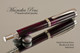 Handmade Rollerball Pen handcrafted from Royal Society Resin with Rhodium and Gold finish.  Bottom view of pen.
