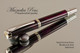 Handmade Rollerball Pen handcrafted from Royal Society Resin with Rhodium and Gold finish.  Top view of pen.