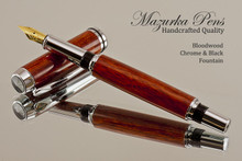 Handcrafted Fountain Pen made from Bloodwood with Chrome and Black finish.  Main view of pen and cap.