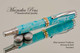 Handmade Fountain Pen handcrafted from Blue Larimar TruStone with Chrome and Gold finish.  Bottom view of pen.