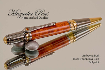 Handmade Ballpoint Pen handcrafted from Amboyna Burl wood Black Titanium and Gold finish.  Main view of pen.
