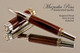 Handcrafted wood pen made from Kingwood with Sterling Silver and Gold finish.  