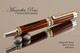 Handcrafted wood pen made from Kingwood with Sterling Silver and Gold finish.  