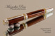 Handcrafted wood pen made from Kingwood with Sterling Silver and Gold finish.  