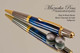 Handmade Ballpoint Pen handcrafted from Blue/Black Poly-Resin with Black Titanium/Gold finish.  Back view of pen.