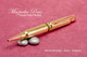 Handmade Double .308 Caliber Ballpoint Bullet Cartridge Pen, Brass Finish - Looking from Tip of Pen (stock photo)