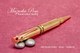 Handmade Double 308 Caliber Ballpoint Bullet Cartridge Pen, Brass Finish - Looking from Top of Pen (stock photo)