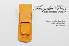 Amber leather pen pouch / pen case.  Shown closed.