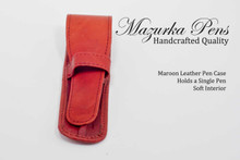 Maroon leather pen pouch / pen case.  Shown closed.