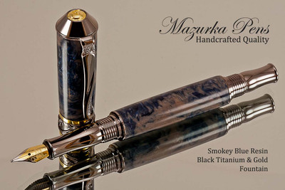 Handmade Smokey Blue Resin Fountain Pen with Black Titanium / Gold trim.  Main view of pen.