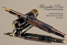 Handmade Smokey Blue Resin Fountain Pen with Black Titanium / Gold trim.  Cap view of pen.