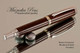 Handmade Fountain Pen made from Desert Ironwood with Rhodium and Gold color accents.  Cap view of pen.