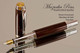 Handmade Fountain Pen made from Desert Ironwood with Rhodium and Gold color accents.  Cap view of pen.