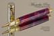 Handmade Rollerball Pen made from Roseus Resin with Chrome finish / gold colored accents.  Side view of pen.