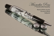 Handcrafted pen made from swirling White and Black Acrylic with Chrome finish and Black accents.  Handcrafted pen by our artist.  Tip of the pen,