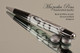 Handcrafted pen made from swirling White and Black Acrylic with Chrome finish and Black accents.  Handcrafted pen by our artist.  Side of the pen,