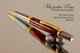 Handmade Ballpoint Pen handcrafted from Red Velvet Poly-Resin with Black Titanium/Gold finish.  Back view of pen.