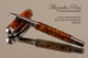 Handmade rollerball pen made from Copper Lightening Resin with Black Titanium / Platinum.  Handcrafted pen by our artist.  