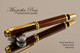Handmade Rollerball Pen made from Desert Ironwood with Black / Gold trim.  Handcrafted pen by our artist.  