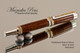 Handcrafted wood pen made from Fiddleback Walnut with Silver and Gold finish.  