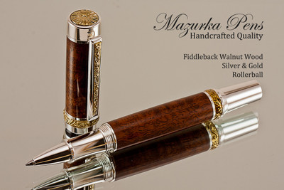 Handcrafted wood pen made from Fiddleback Walnut with Silver and Gold finish.  
