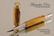 Handmade Rollerball Pen made from Black & White Ebony with Rhodium/Gold color trim.  Handcrafted pen by our artist. 