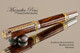 Handcrafted wood pen made from Honduran Rosewood Burl (HRB) with Silver and Gold finish.  