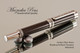Handmade Rollerball pen made from Carbon Fiber / Resin with Rhodium / Black Titanium finish.   Stock Picture