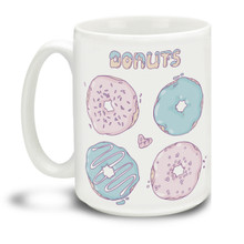 Are you a donut fan? What a great way to start your day, with these pretty pink and blue pastel donuts! This mug is a fun way to dunk your doughnuts in coffee! 15oz Pasel Donuts coffee mugs are durable, dishwasher and microwave safe.
