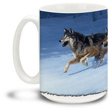 A hearty wolf pack runs in the winter forest. These wolves are after something primal! 15oz coffee mug