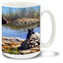 Majestic and playful Black Bears roam the riverbanks.